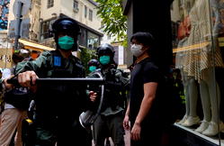 Protesters mass in Hong Kong as anthem law is debated