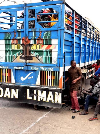 50 passengers found inside trailer loaded with fruits in Kwara
