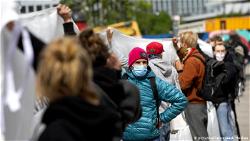 Thousands rally against Spain coronavirus response, urge PM to quit