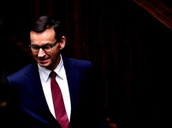 Poland apologises after PM fails to observe virus rules