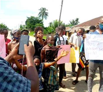 [ICYMI] Ogoni women go topless, vow full nude protest over detention of demolished hotel manager