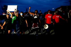 US cities erupt in more violence amid threats from Trump