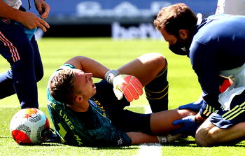 Arsenal keeper Leno stretchered off in agony at Brighton