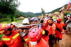 Landslides leave at least 14 dead or missing in China