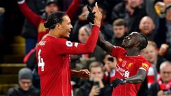 Liverpool lay down Premier League marker in 3-1 Arsenal win