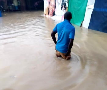 PHOTOS: Residents panic as flood takes over Agege