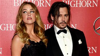 Amber Heard accuses Johnny Depp of threatening to kill her