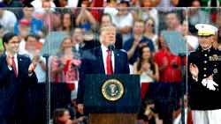 Trump flies back to White House over cheering fans