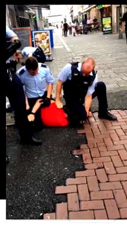 Video of German policeman with knee on man’s head prompts probe