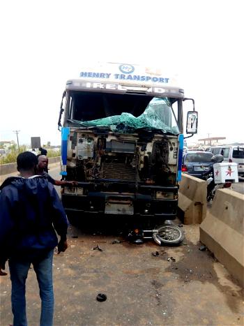 PHOTOS: Truck crushes Okada rider to death on Lagos/Ibadan Expressway
