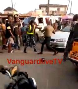 VIDEO: Soldier beats up female police officer in Lagos