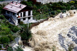 Two killed, 24 missing in severe floods in Italy and France