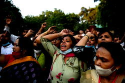 Police officers suspended over India gang rape death amid protests