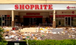 Looters voluntarily returning items to designated places in Ilorin