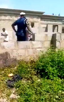 Video: Officer spotted carting away palliative items
