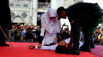 Indonesian man collapses during flogging for child rape