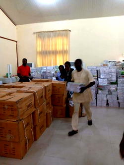 OSOPADEC distributes educational materials to students