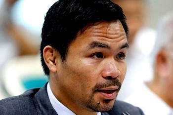 Boxing icon, Pacquiao takes over as head of Philippine ruling party