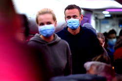 Plane diverted, allies arrested as Kremlin critic Navalny arrives home