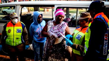 South Africa police arrest thousands for not wearing masks