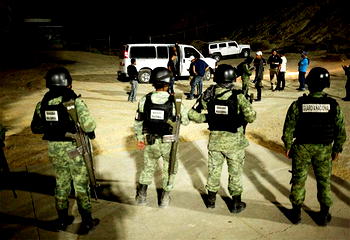12 police officers arrested in Mexico after discovering 19 corpses