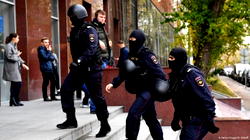 Russian police raid homes of Jehovah’s Witnesses