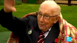 Britain mourns ‘hero’ Captain Tom Moore with flowers, lights