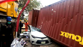 Container falls, crushes car in Lagos