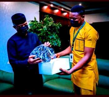 Osinbajo encourages Nigerian shoemaker, wears his product