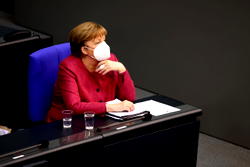 ‘I am delighted’: Merkel receives AstraZeneca vaccine shot