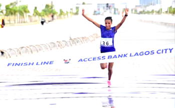 Ethiopia’s Meseret Dinke wins female category of 2021 Access Bank Lagos City Marathon. Photo AKEEM SALAU