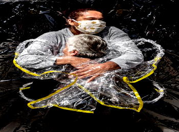 Image of pandemic embrace wins World Press Photo award