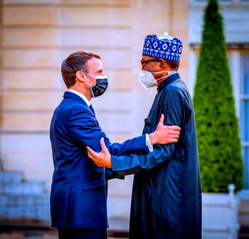 PHOTOS: President Buhari received by French President Macron in  Paris