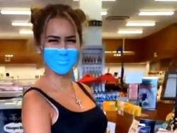 Russian woman deported for ‘painting face’ as face mask