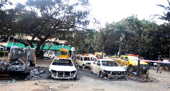 Images from midnight fire that killed 5, destroyed 25 vehicles
