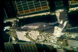 Daring astronauts install solar panels on space station