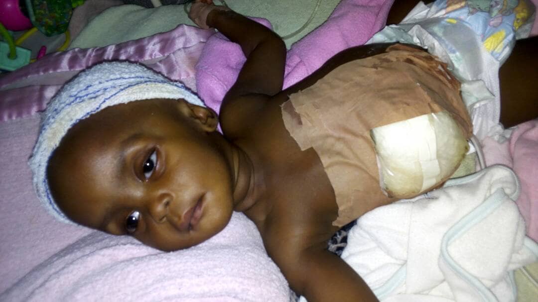 How a PhD graduate mother nearly committed suicide after her baby was diagnosed with 'excess water in the brain'
