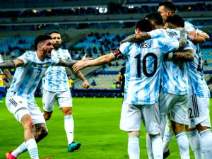 Messi floats ball into goal in win over Uruguay