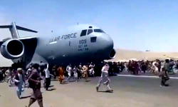 Desperation mounts at Kabul airport amid reports of Taliban reprisals