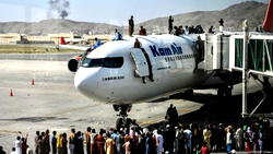 Crowds continue to gather at Kabul airport hoping for evacuation