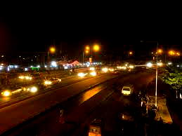 NO STREET LIGHT: Commuters scamper for safety as armed men attack stadium