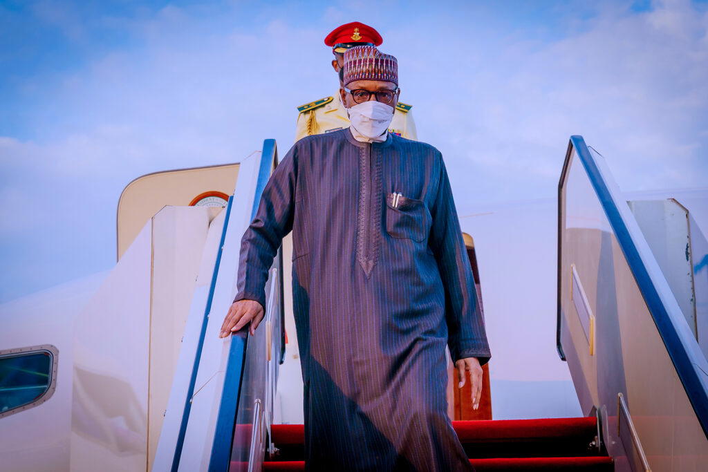 President Buhari returns from UK