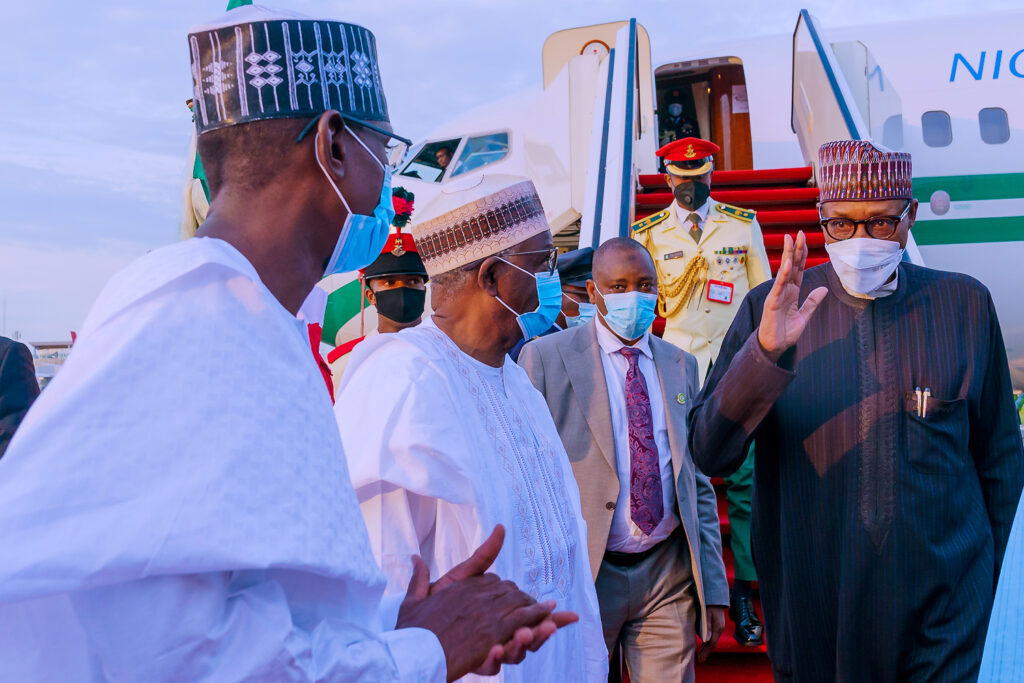 President Buhari returns from UK