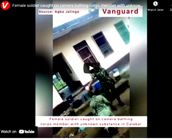 Female soldier caught on camera bathing corps member with unknown substance in Calabar
