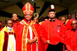 Edo speaker invested into knighthood of St Christopher