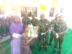 Guards Brigade conducts CIMIC to Schools in Abuja; 1,000 students get free books, pens