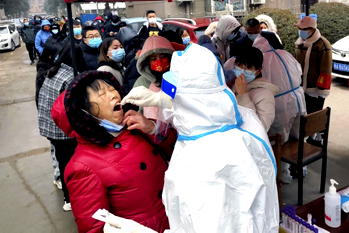 China locks down 3rd city, raising affected to 20 million