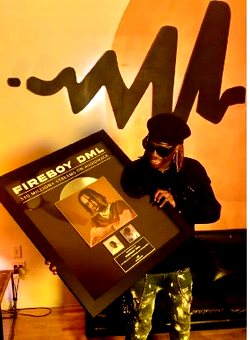 Fireboy DML receives Plaque from Audiomack for hitting over 350 million streams