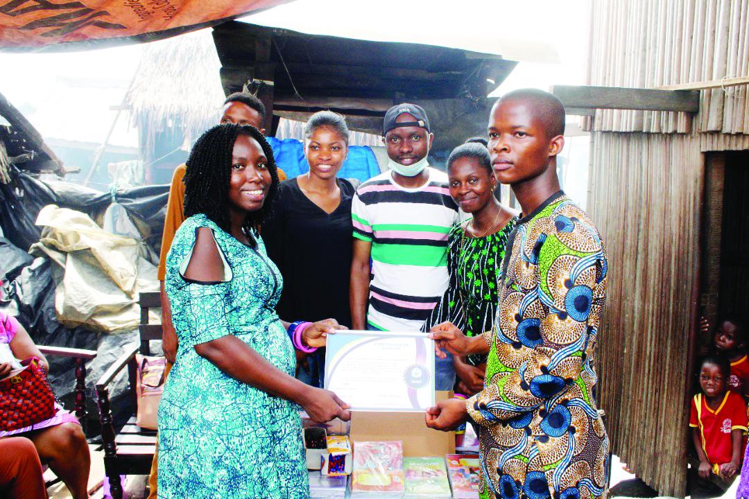 Vanguard report: NGO donates books, stationery to Makoko pupils