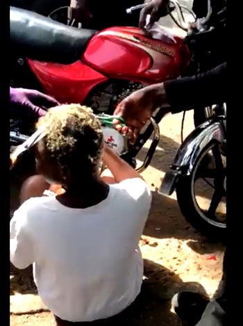 Hunters Group cut lady’s dyed hair in Makurdi